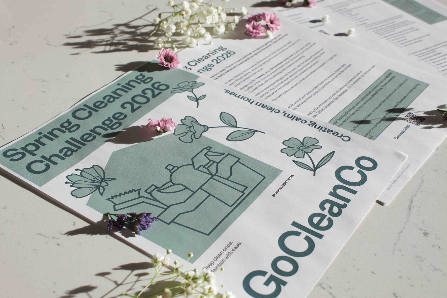 GoCleanCo Spring Cleaning Challenge 2026 pdf with floral decorations on a light surface