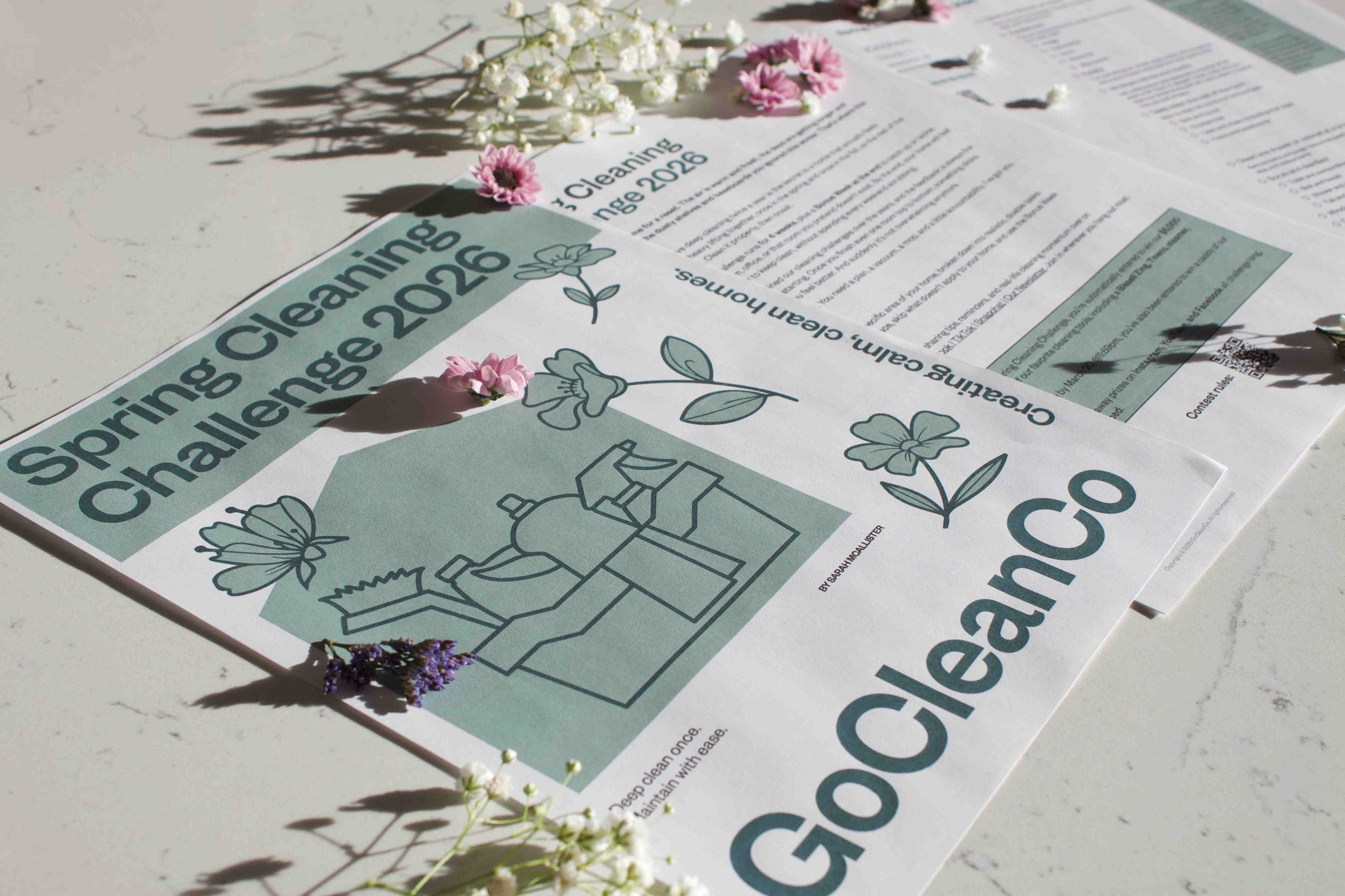 GoCleanCo Spring Cleaning Challenge 2026 pdf with floral decorations on a light surface