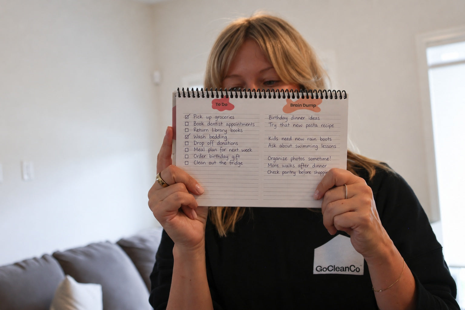A spiral bound weekly planner is shown, with to do and brain dump columns, showing a list of tasks. 